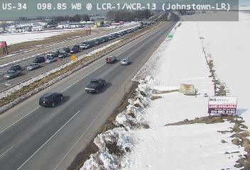 US 34 - US-34  098.85 WB @ LCR-1/WCR-13 (Johnstown-LR) - Traffic closest to camera is travelling West - (13724) - Denver and Colorado