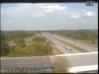 I-94 @ Haggerty Rd-Traffic closest to camera is traveling west (270) - USA
