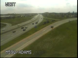 M-59 @ Adams-Traffic closest to camera is traveling west (2230) - USA